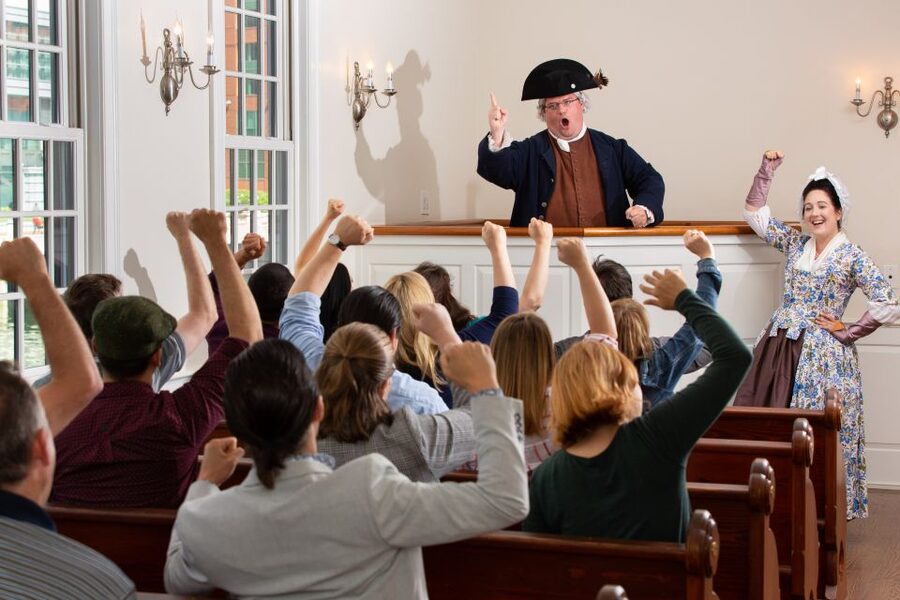 Boston: Boston Tea Party Ships and Museum Interactive Tour - Throwing the tea crate overboard