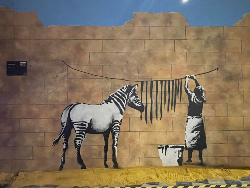 Brussels: The World of Banksy Museum Permanent Exhibition - Full-size murals and the missing street setting