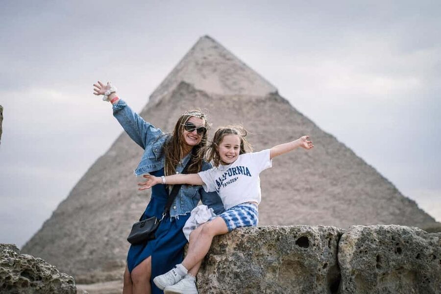 Cairo Day Tour: Pyramids, Museum, Camel Ride & Local Lunch - A camel ride with wide pyramid views