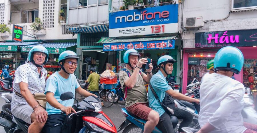 City Tour By Motorbike w/ War Museum & Reunification Palace - City Hall, the Opera House, and Nguyen Hue Walking Street