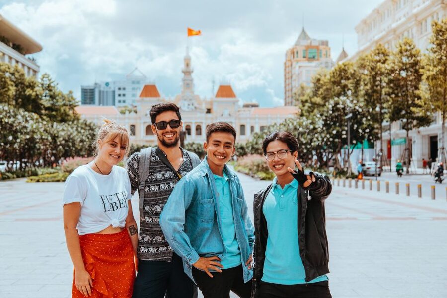 City Tour By Motorbike w/ War Museum & Reunification Palace - Ben Thanh Market and everyday city life
