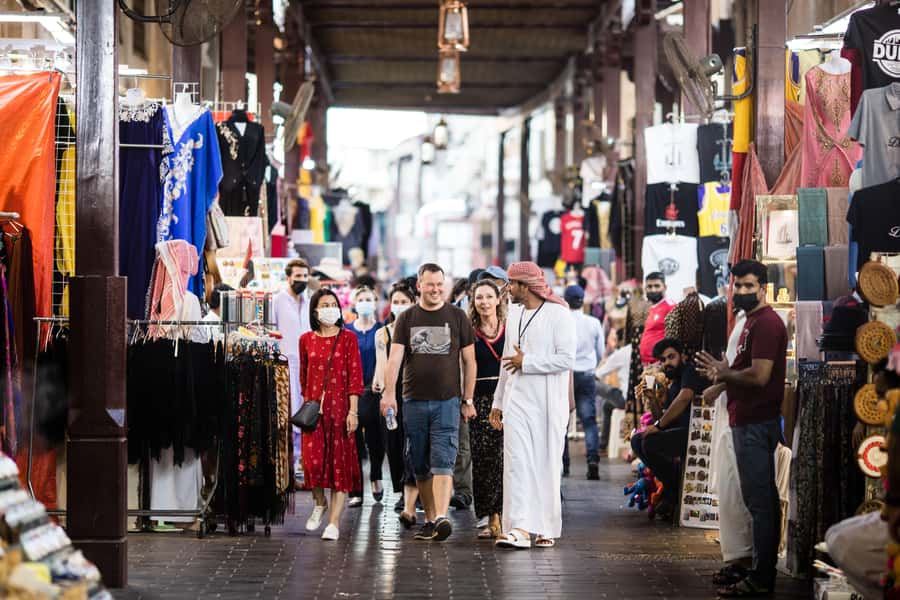 Dubai: Old Town, Creek, Museums, Souks, & Street Food Tour - Crossing the creek by traditional abra