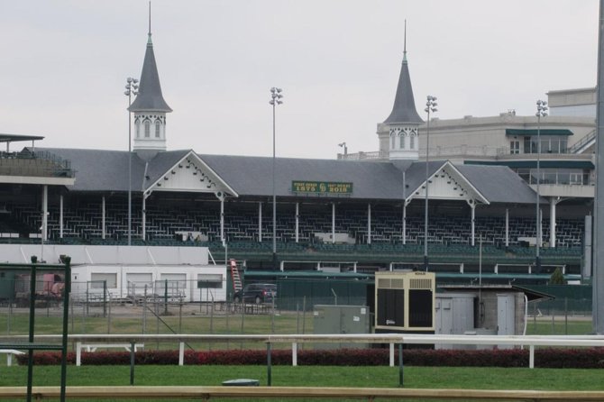 Kentucky Derby Museum - General Admission and Guided Track Visit - Walking the grandstands and reaching the track rail