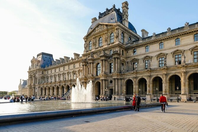 Louvre Priority Access with Mona Lisa Escort or Guided Option - Winged Victory and the grand staircase