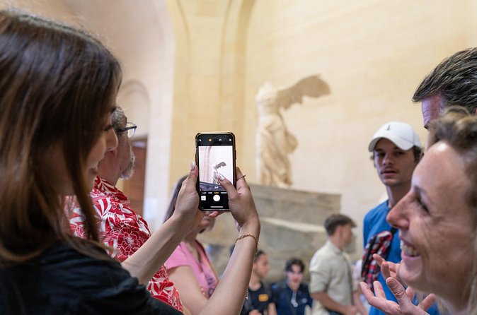 Paris Louvre Museum: Small Group Guided Highlights Tour - French paintings, Michelangelo, and royal rooms
