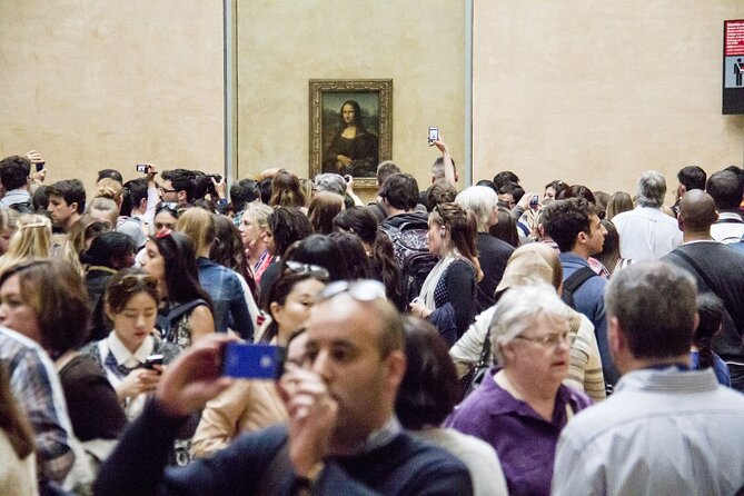Paris: Louvre Museum Tour Mona Lisa & Iconic Masterpieces - Entering through the Louvre pyramid