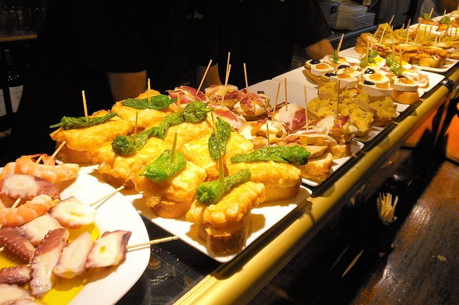 Private Barcelona Art and Tapas Walking Tour with Picasso Museum - Spanish and Catalan meat dishes to finish