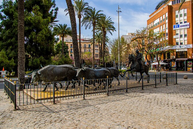 Private Guided Visit to the Alicante Bullring and Museum - Museum displays: costumes, posters, and art