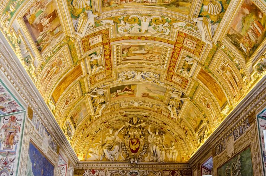 Rome: Vatican Museums & Sistine Chapel Small Group Tour - Maps, painted ceilings, and the long walk toward the chapel