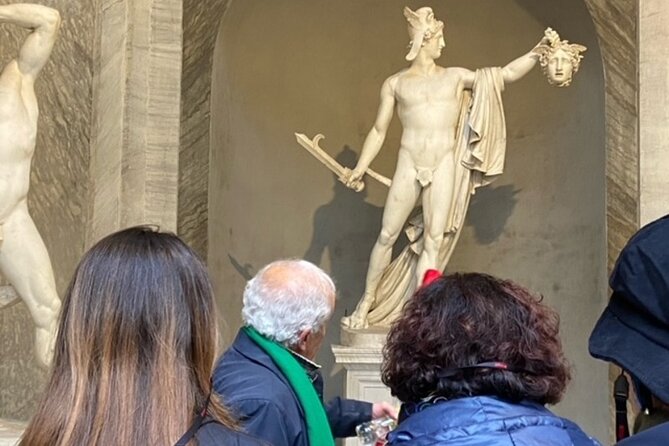 Vatican Museums, Sistine Chapel Tour and Basilica Access - Maps, wall hangings, and the long walk to the chapel